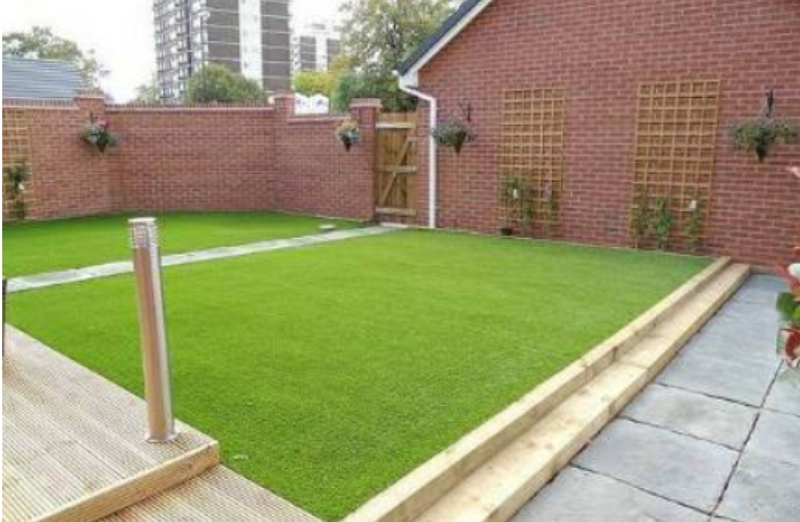 Image of artificial grass installed in back yard